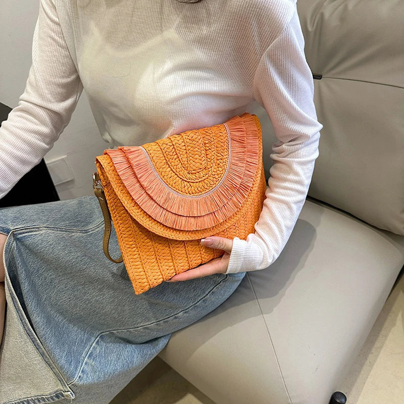 “Zanara” Woven Fringe Clutch